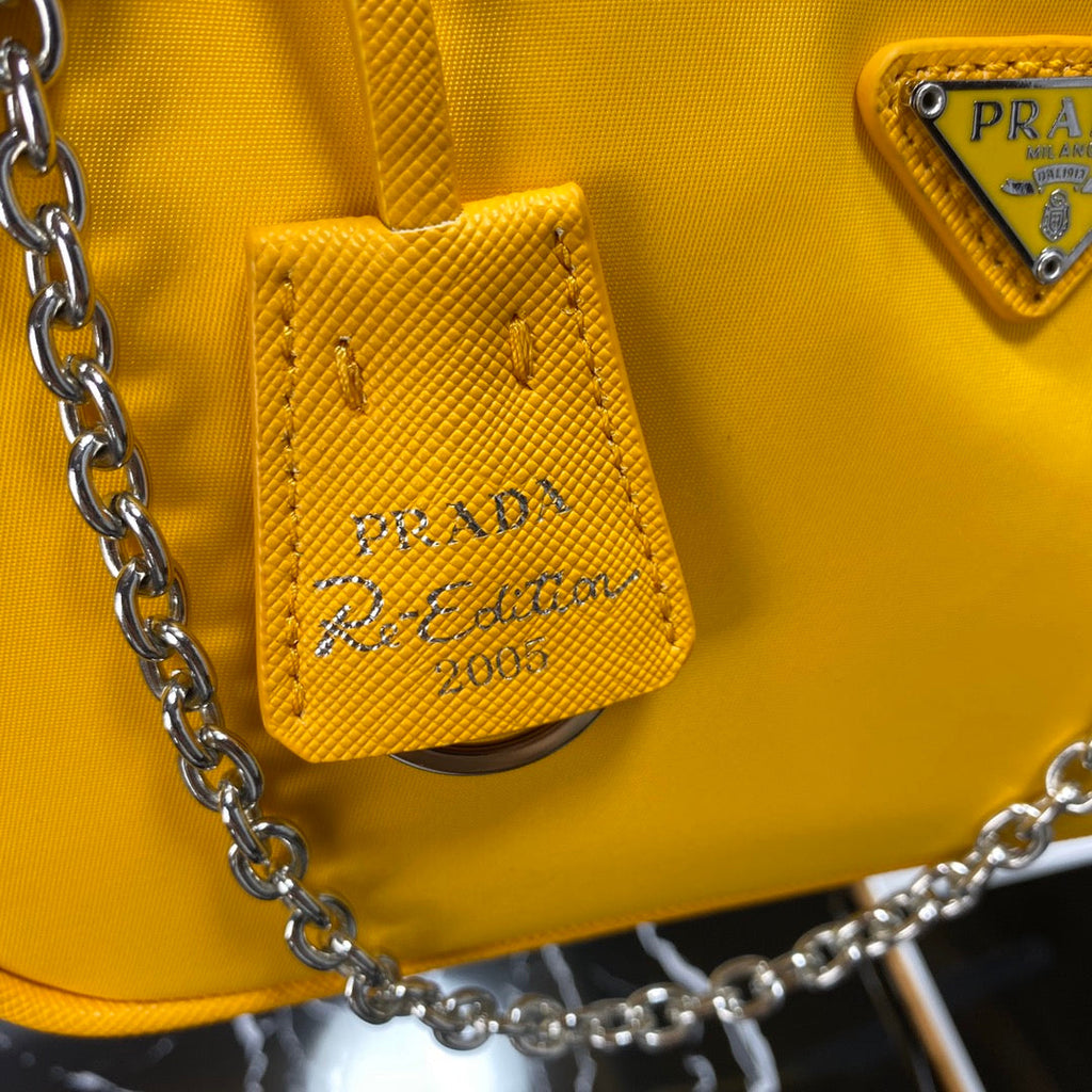 PRADA HOBO 22 BAG IN AMBER YELLOW RE-NYLON