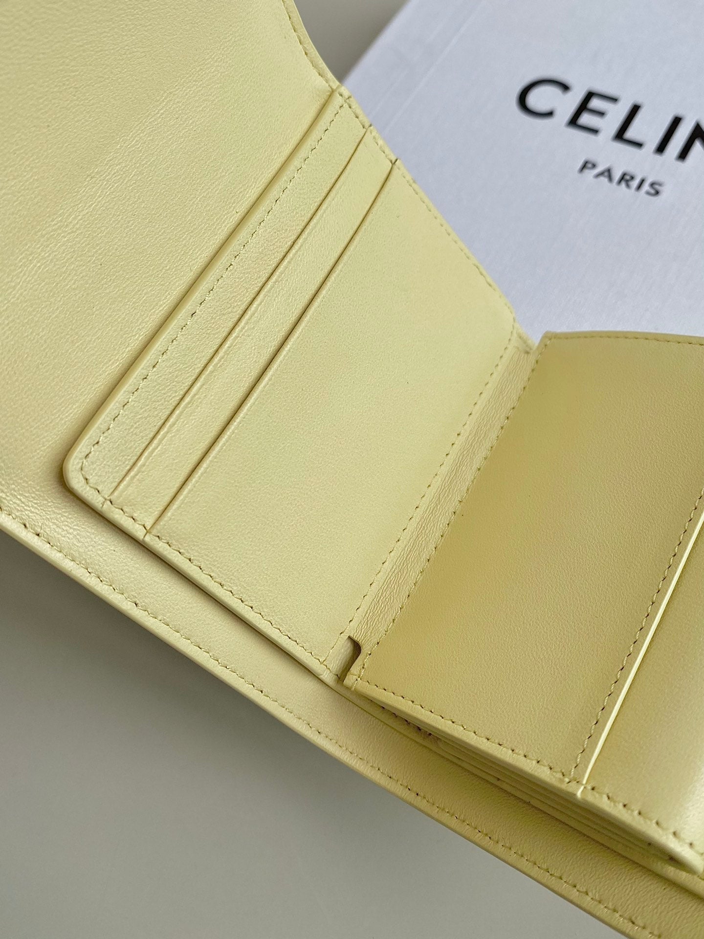 CELINE TRIPHOME 10 TRIFOLD WALLET CALFSKIN YELLOW PASTEL