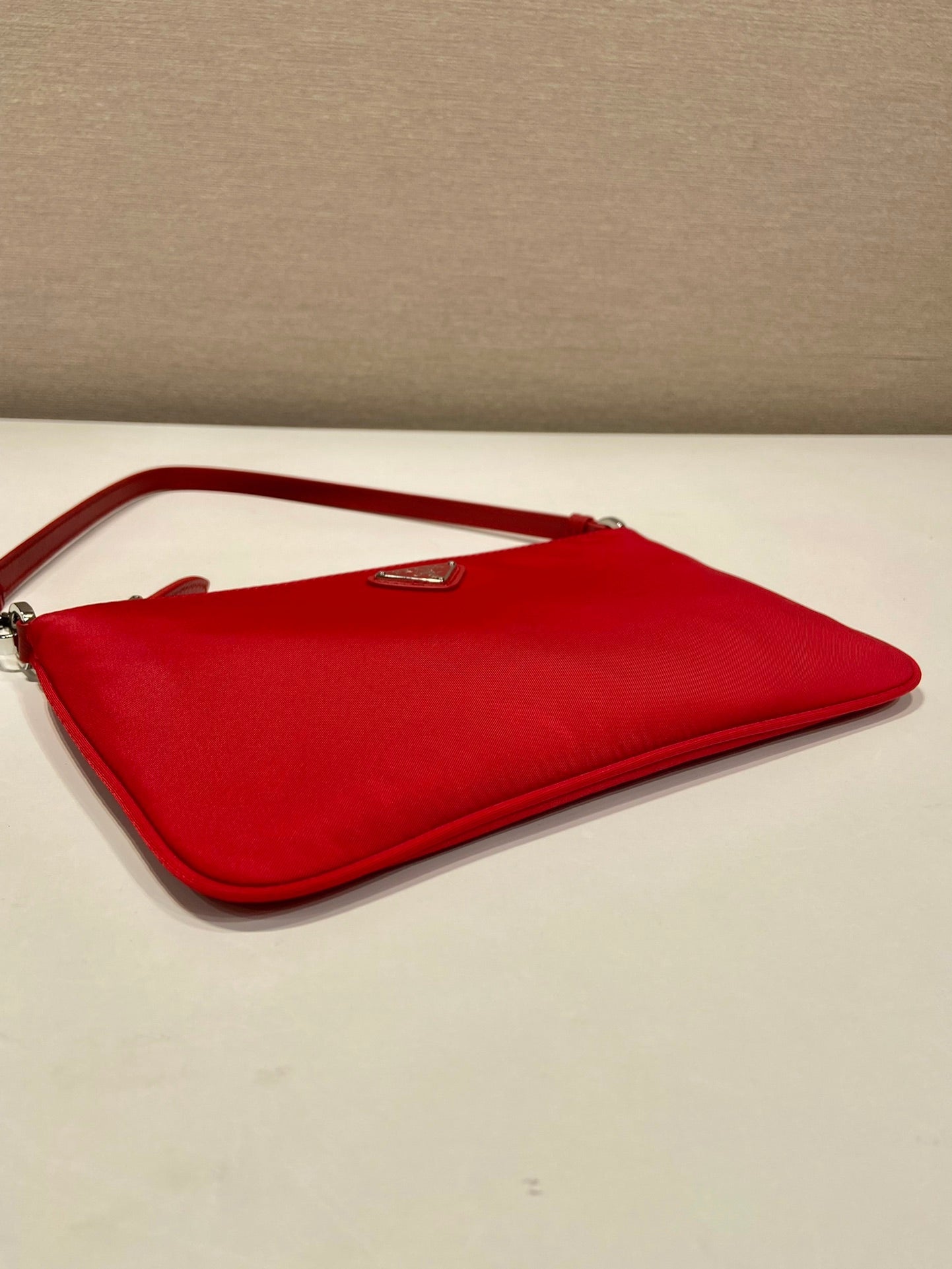 PRADA SHOULDER BAG 24 WITH TRIANGLE LOGO IN PASSION RED RE-NYLON FABRIC