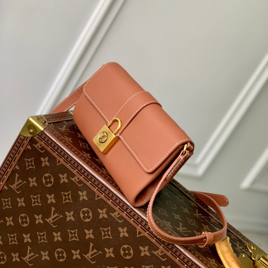 LOUIS VUITTON LOW KEY BAG 22 IN COGNAC BROWN CALFSKIN