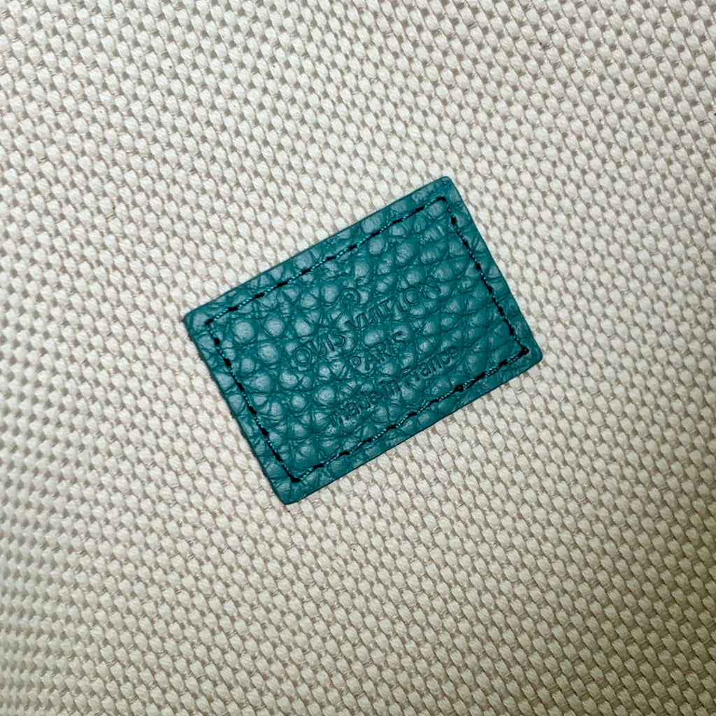 LOUIS VUITTON STEAMER WEARABLE WALLET 18 IN TEAL GREEN MONOGRAM TAURILLON CALFSKIN