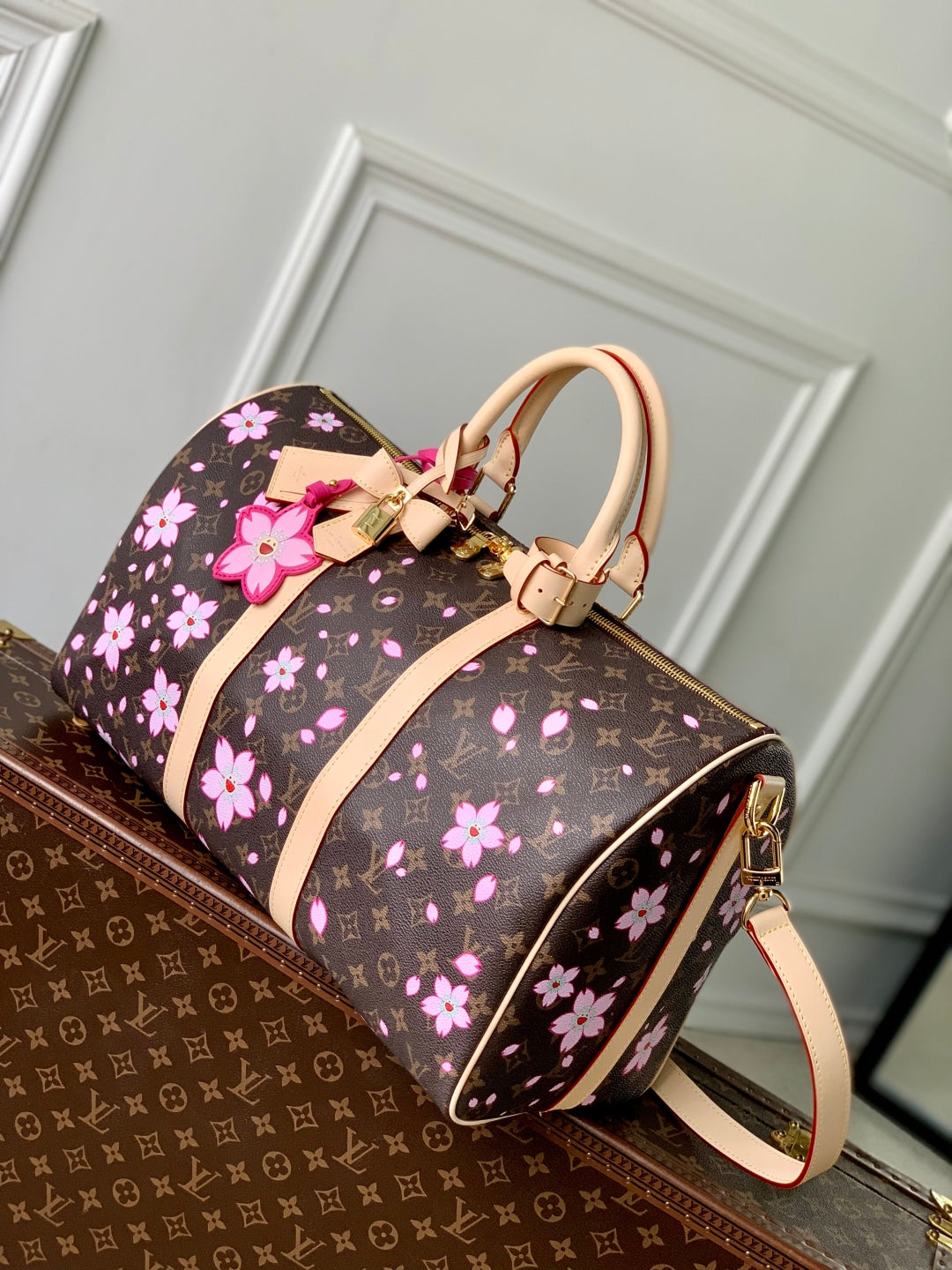 LOUIS VUITTON KEEPALL BANDOULIÈRE CHERRY BLOSSOM 45 IN SAKURA BROWN MONOGRAM COATED CANVAS