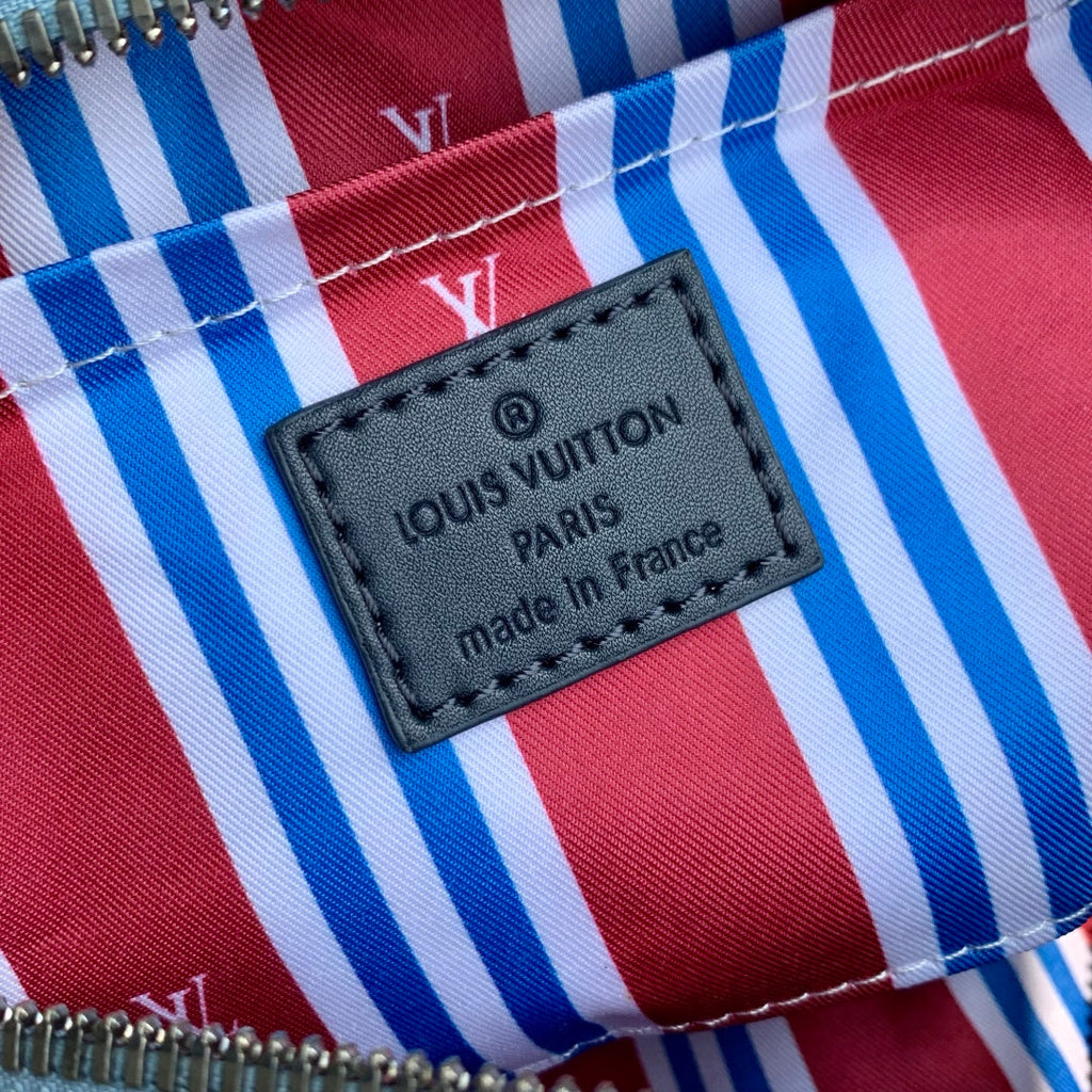 LOUIS VUITTON KEEPALL BANDOULIÈRE 25 INSKY BLUE MONOGRAM HERITAGE CANVAS DARK BLUE CALFSKIN