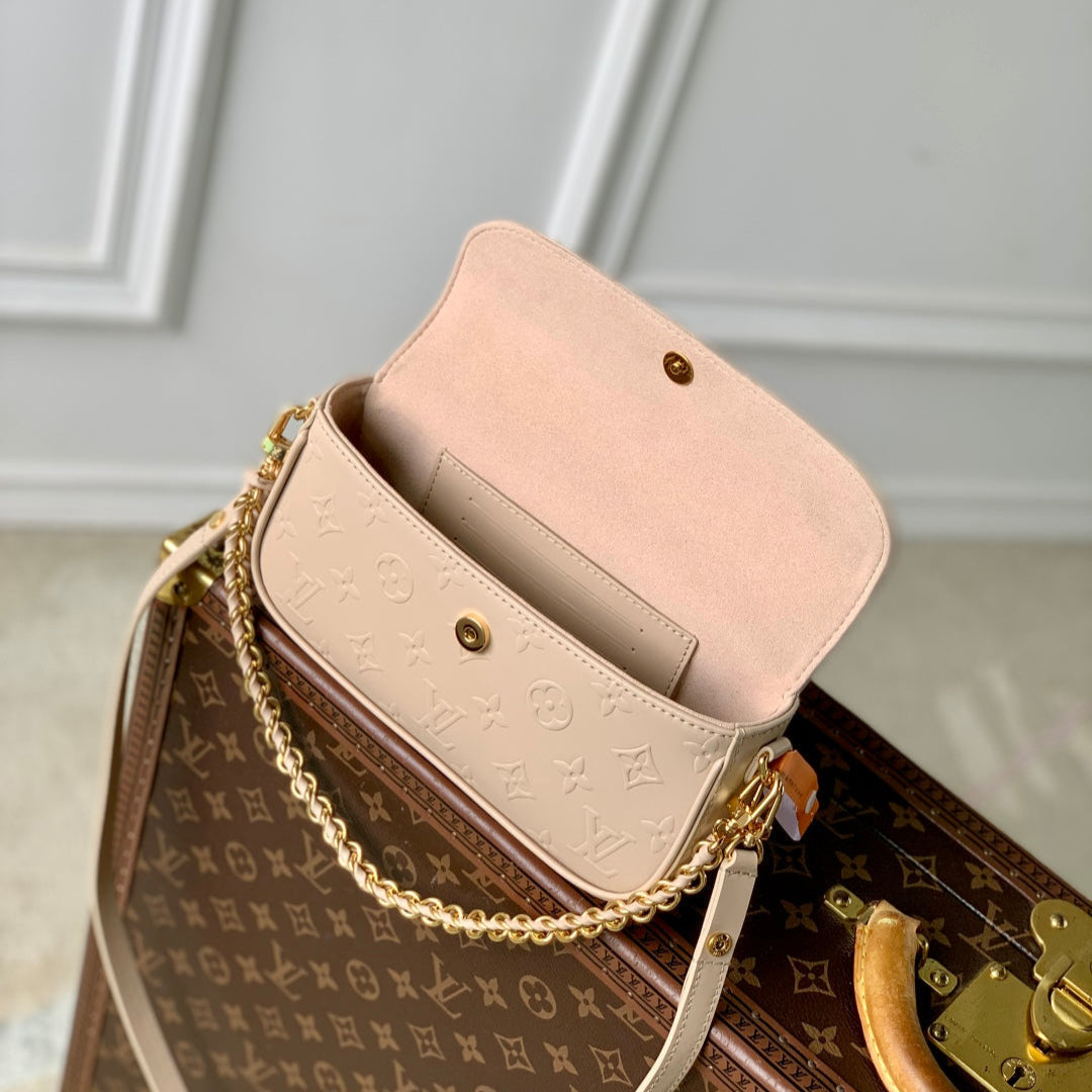 LOUIS VUITTON WALLET ON CHAIN IVY 23 IN BEIGE MONOGRAM REVERSE CANVAS EMBOSSED LOGO
