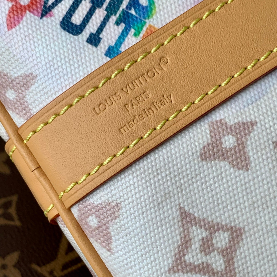 LOUIS VUITTON KEEPALL BANDOULIÈRE 45 IN WHITE MONOGRAM DUNE CANVAS AND CALFSKIN