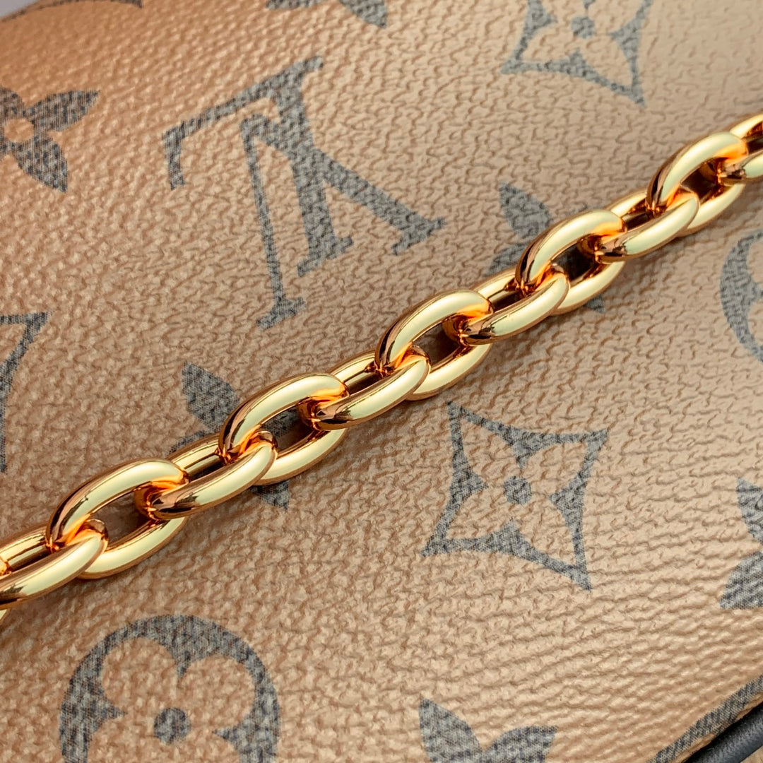 LOUIS VUITTON WALLET ON CHAIN IVY 23 IN BROWN MONOGRAM REVERSE CANVAS
