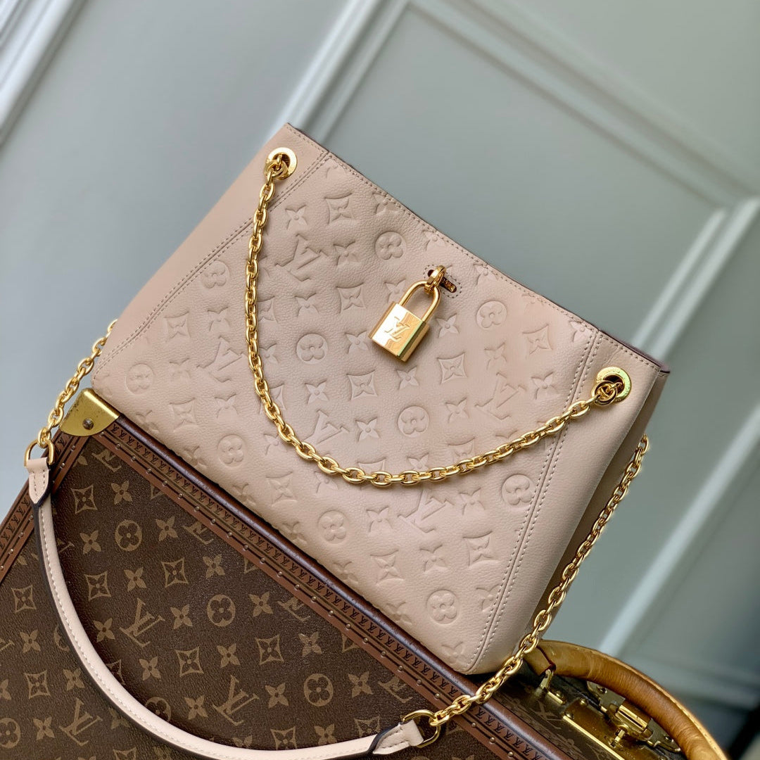 LOUIS VUITTON ANYTIME PM 34 IN NUDE PINK MONOGRAM EMPREINTE CALFSKIN