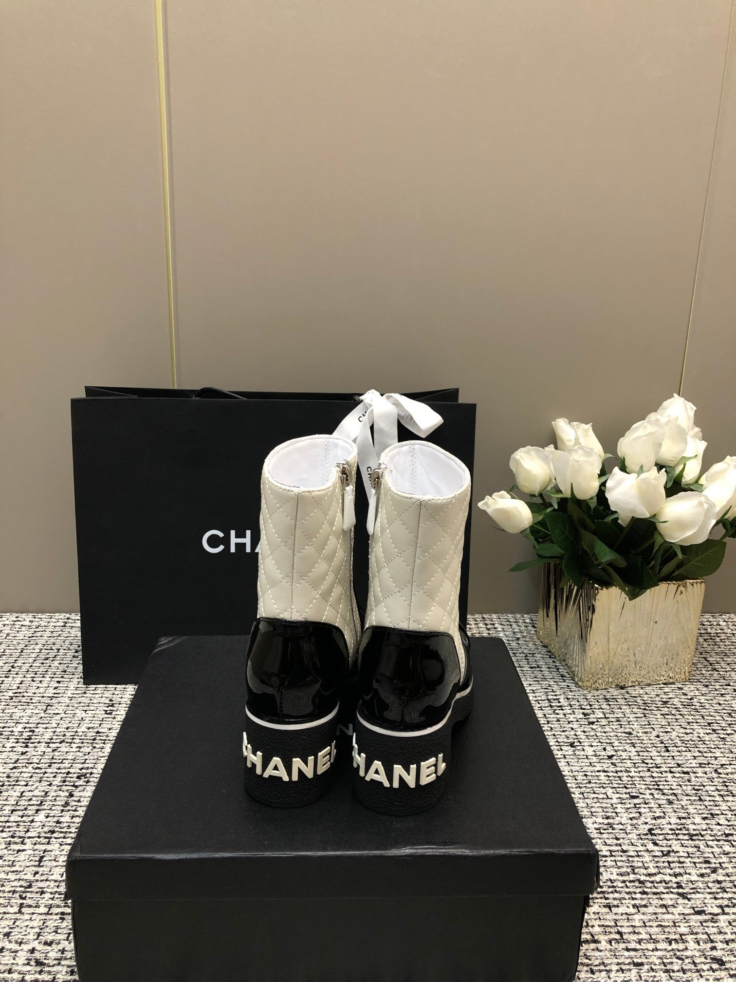 CHANEL ROUND-TOE SHORT BOOTS BLACK MIX WHITE SHEEPSKIN