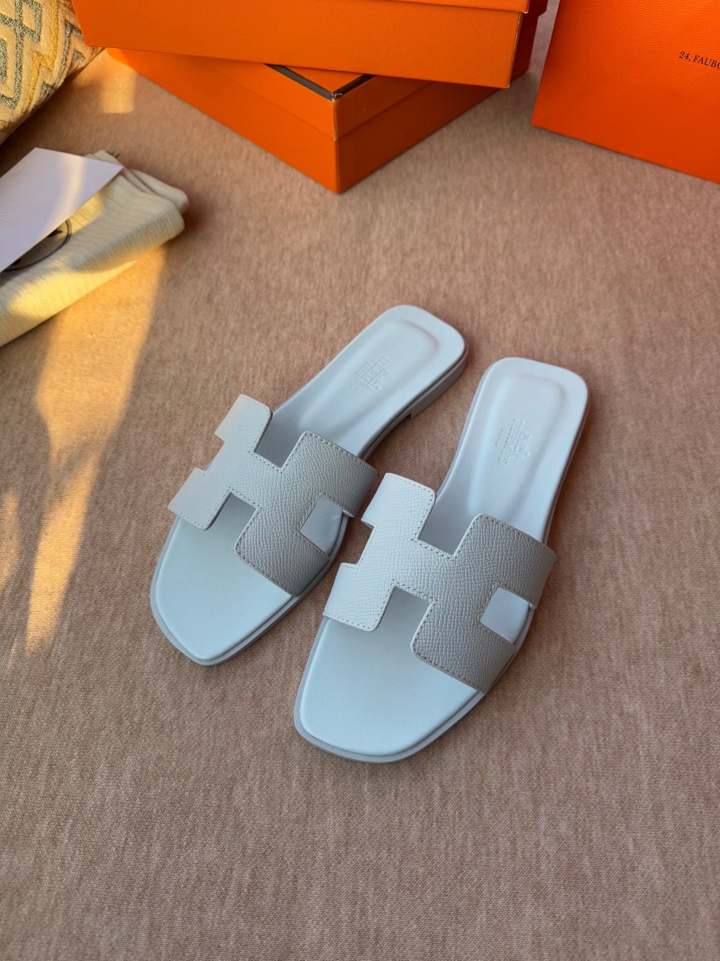 HERMES 0RAN SANDALS IN ICE BLUE CALFSKIN