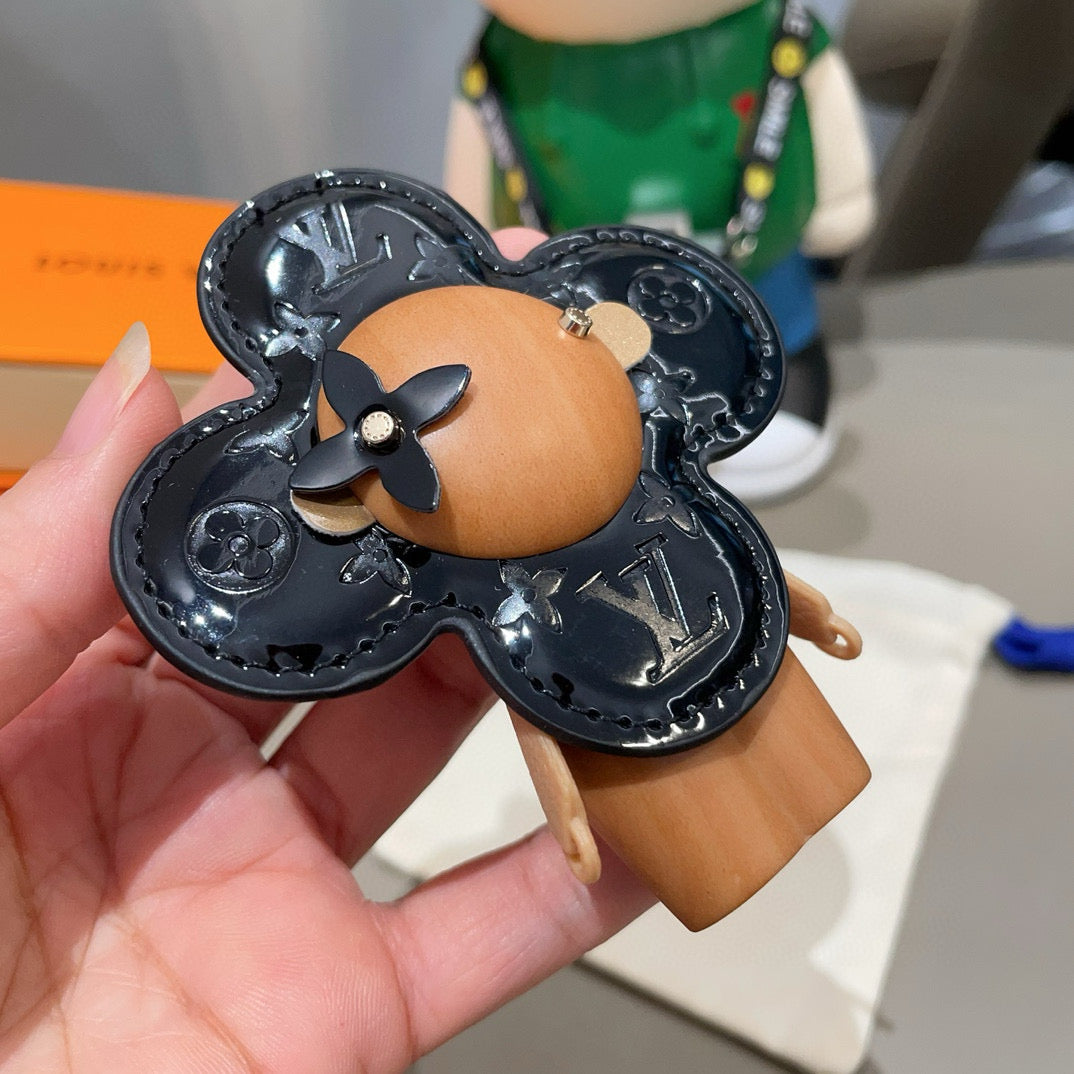 LOUIS VUITTON LV KEYCHAIN IN BLACK CALFSKIN AND WOOD
