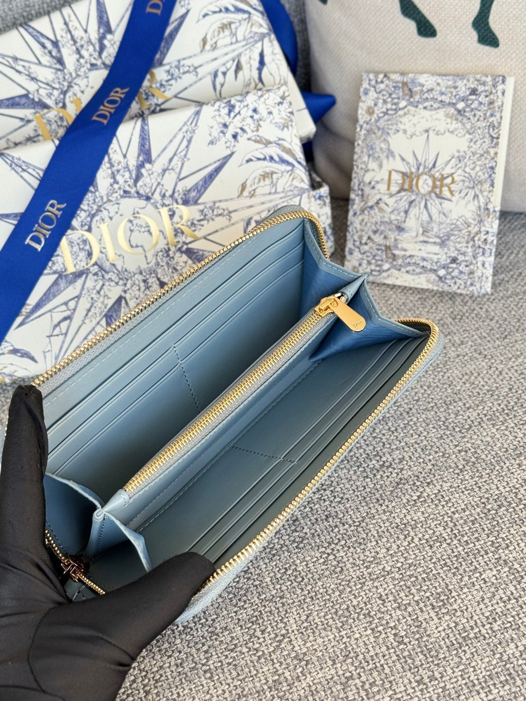DIOR VERTICAL LONG ZIP WALLET 20 IN BABY BLUE QUILTED ALLOVER CALFSKIN
