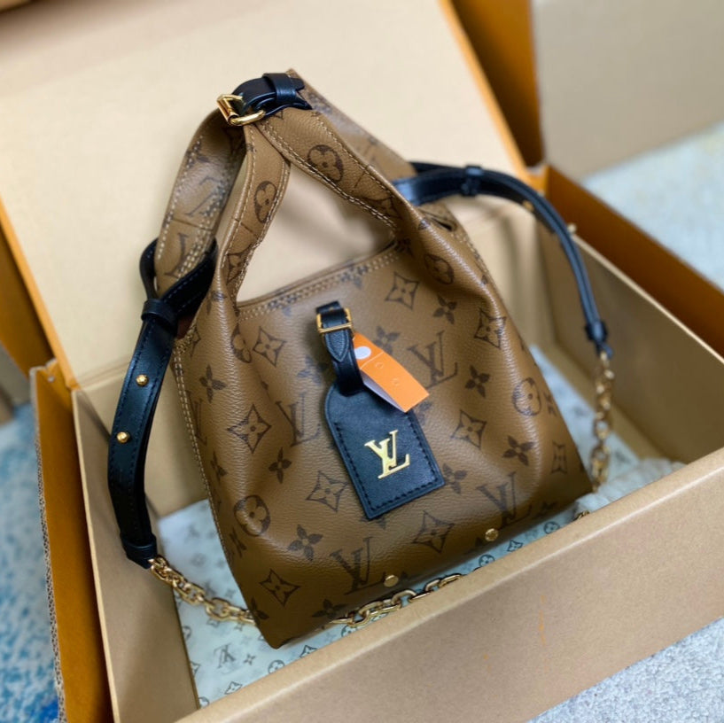 LOUIS VUITTON ATLANTIS BB 17 IN BROWN MONOGRAM REVERSE CANVAS