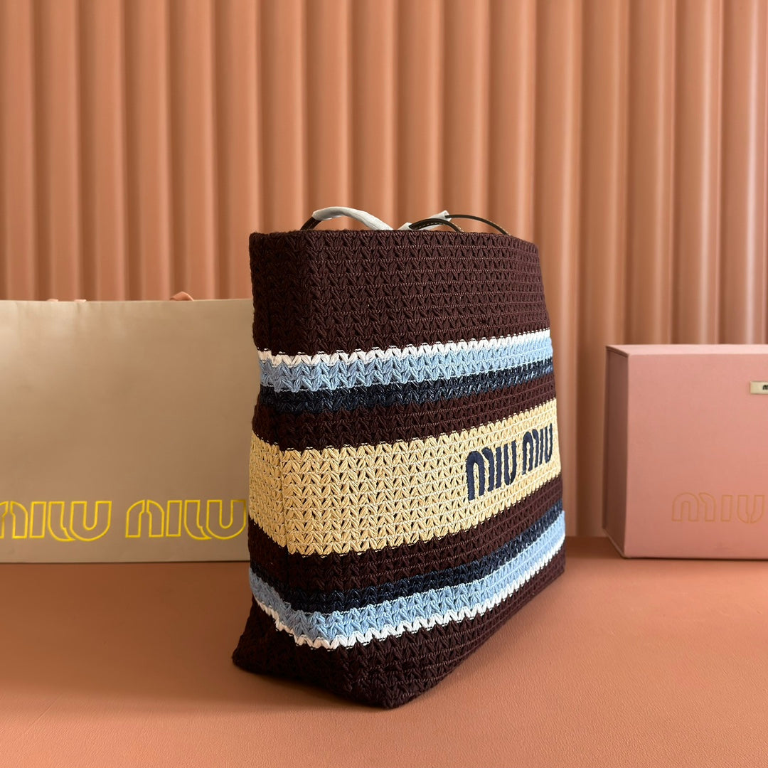 TOTE BAG 40 IN STRIPED PATTERN OF BROWN BLUE AND YELLOW WOVEN RAFFIA