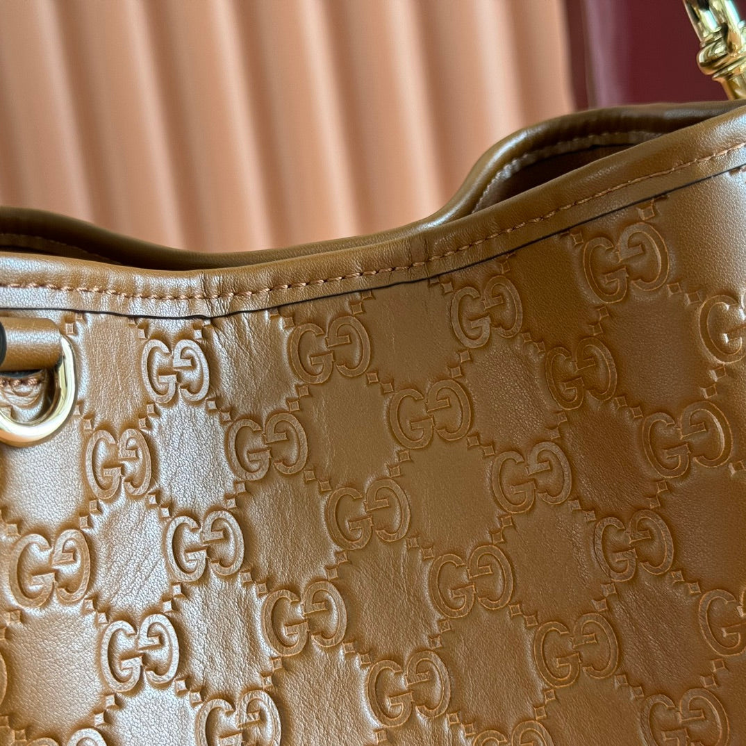 GUCCI 26S HAND BAG 19 IN BROWN CALFSKIN WITH MONOGRAM PATTERN