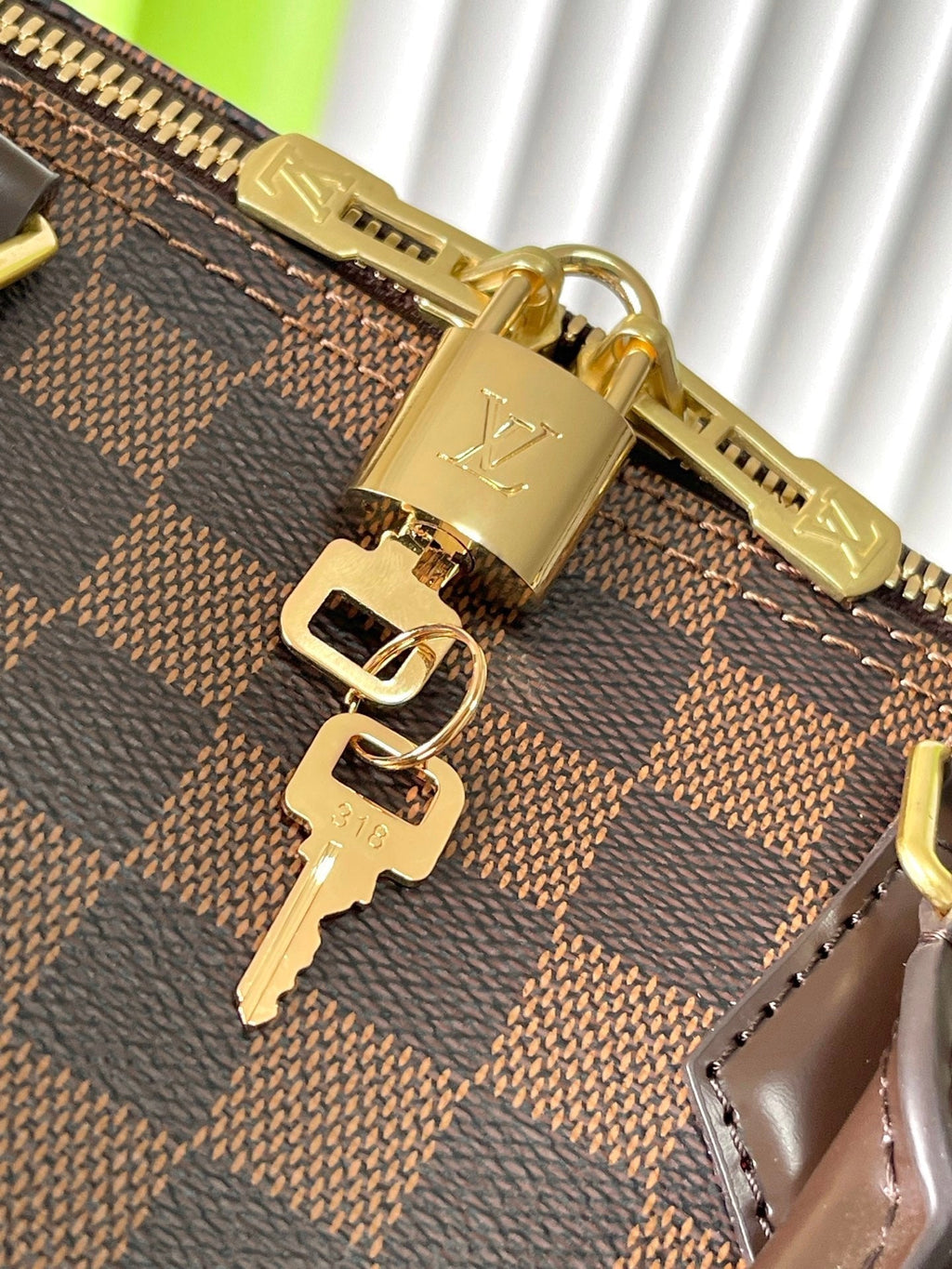 LOUIS VUITTON SPEEDY BANDOLIÈRE 30 IN DARK BROWN DAMIER EBENE CANVAS GOLD LOCK