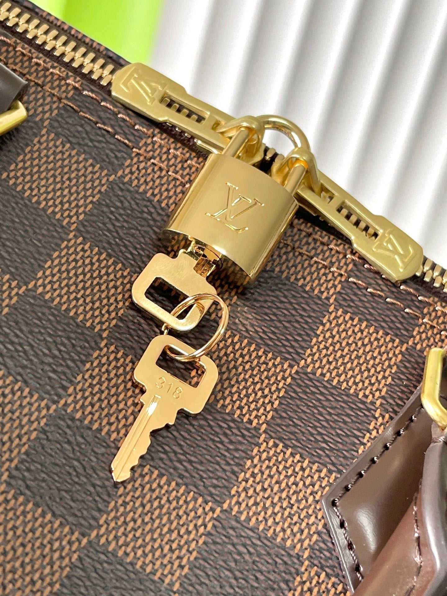 LOUIS VUITTON SPEEDY BANDOLIÈRE 30 IN DARK BROWN DAMIER EBENE CANVAS GOLD LOCK