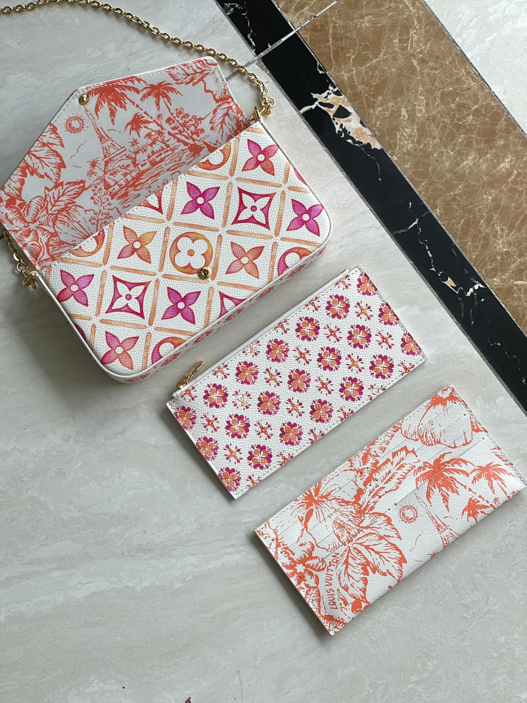 LOUIS VUITTON FÉLICIE POCHETTE 21 IN CORAL MONOGRAM TILES CANVAS