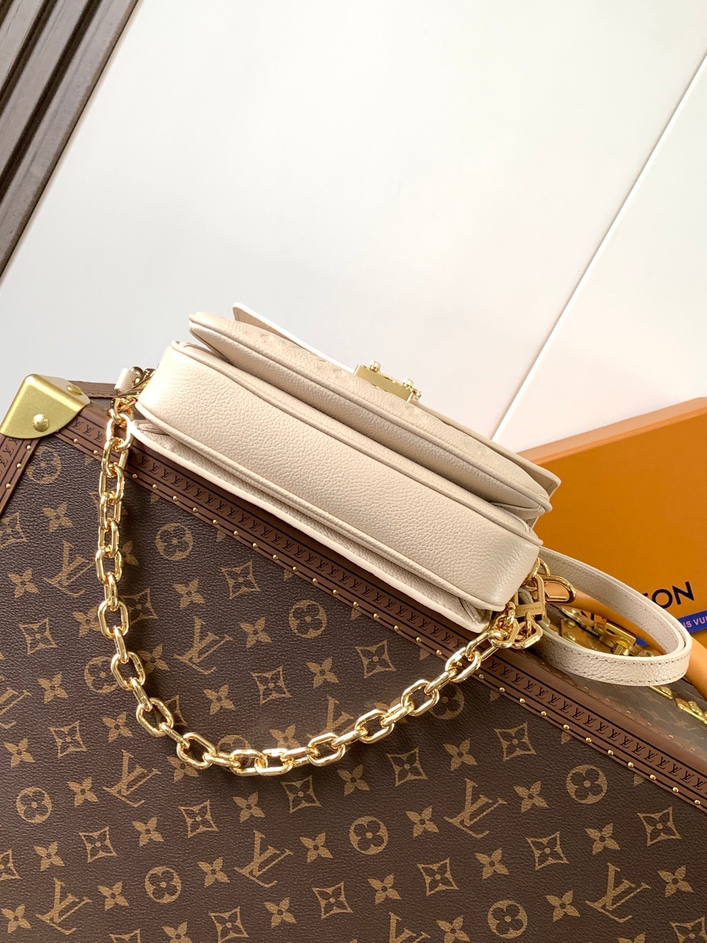 LOUIS VUITTON POCHETTE MÉTIS EAST WEST 22 IN LIGHT BEIGE MONOGRAM EMPREINTE CALFSKIN EMBOSSED