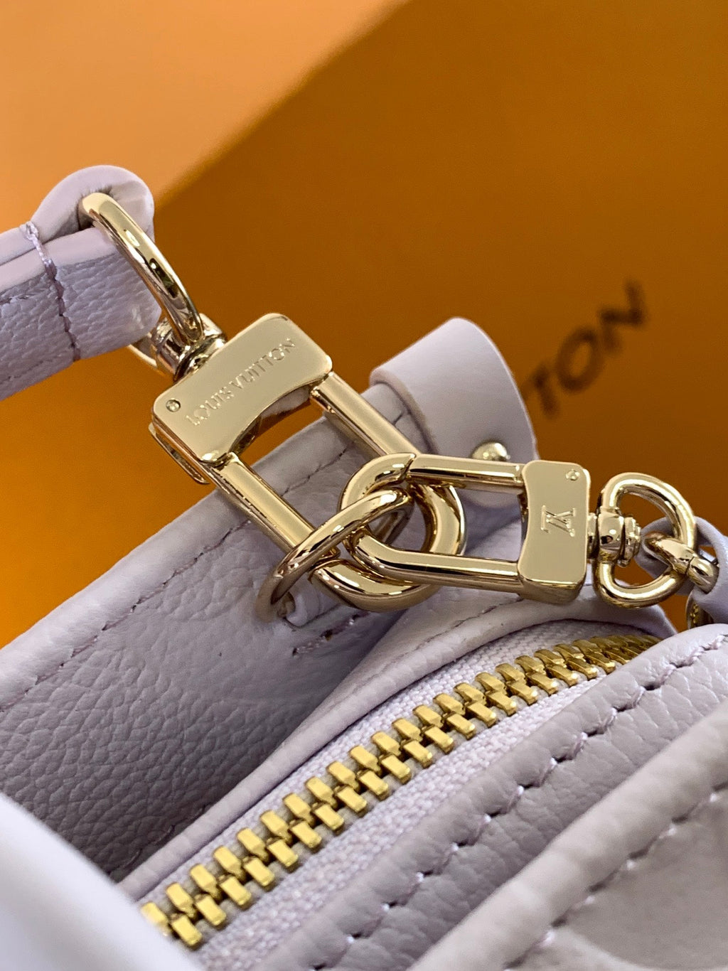 LOUIS VUITTON LV 25S ONTHEGO EAST WEST BAG 25 IN LIGHT LAVENDER CALFSKIN MONOGRAM EMPREINTE