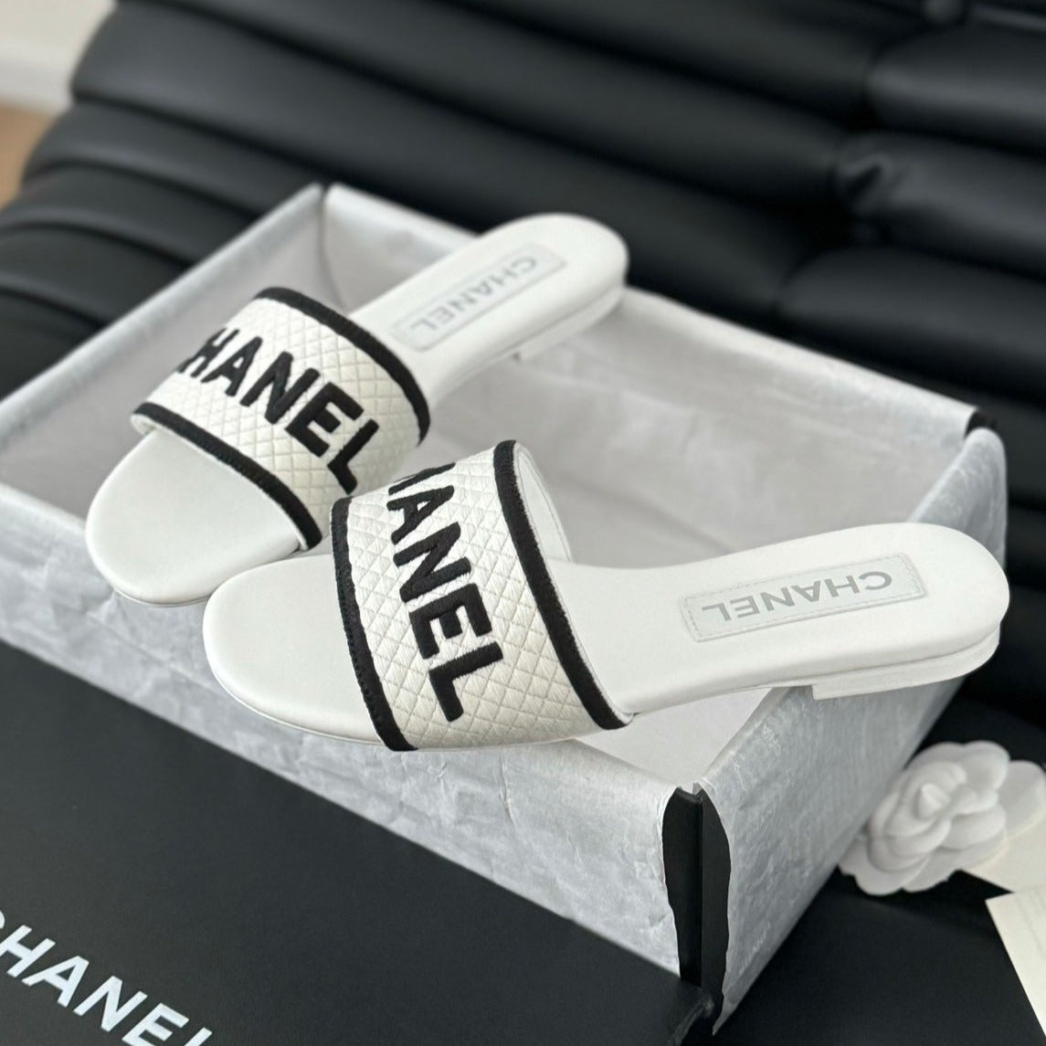CHANEL Woven Embroidered Letter Slippers White Black