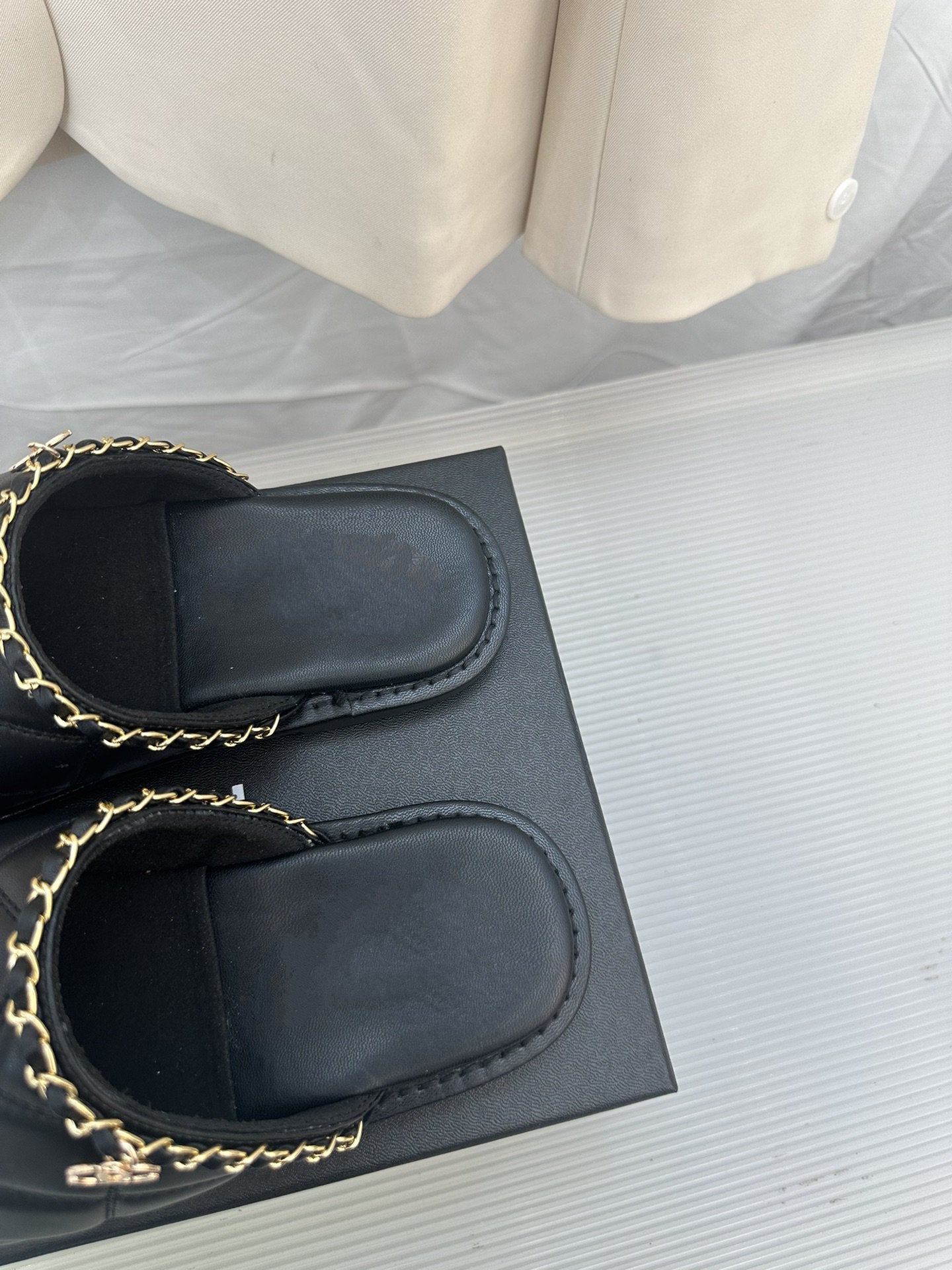 CHANEL Black Lambskin Gold Chain Mules