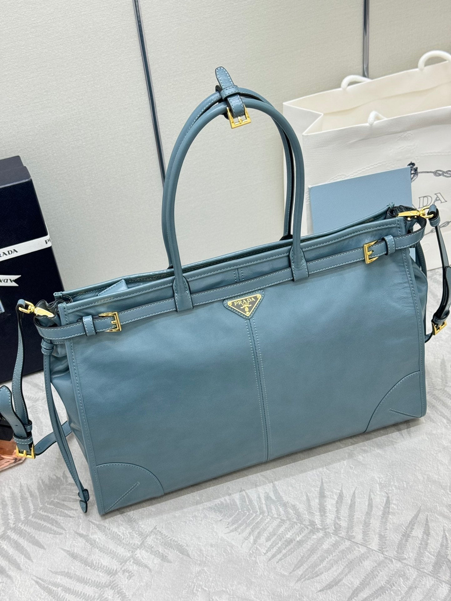 PRADA 25S LUX SOFT BAG 42 IN BLUE GLOSSY CALFSKIN GOLD HARDWARE