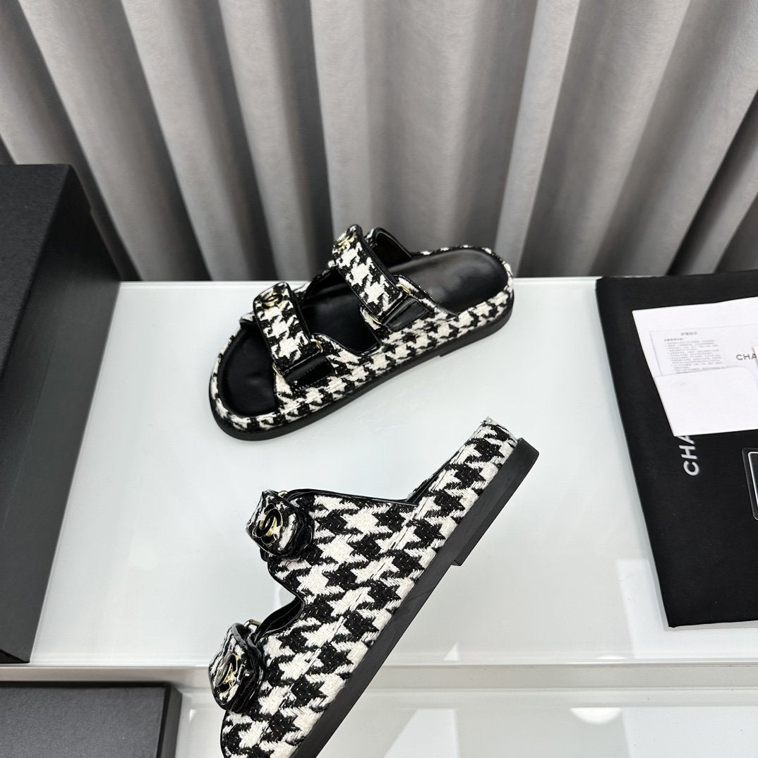 CHANEL dad sandals black white mules